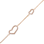 Delicate chain bracelet featuring two open pavé hearts