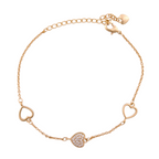 Gold-plated bracelet with pavé heart centre and open heart charms on a white background