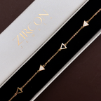 Triangle charm bracelet displayed in Zircon Jewels gift box
