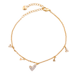 18K gold-plated layered heart charm bracelet with pavé heart on a white background