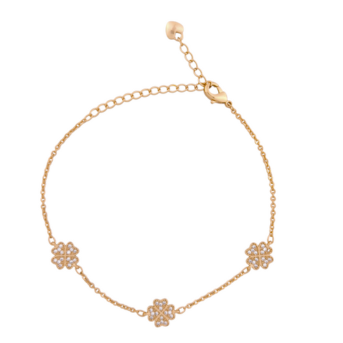 18K gold-plated floral charm bracelet with pavé stones on a white background