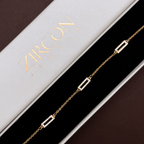 Gold rectangular bar bracelet displayed in Zircon Jewels gift box