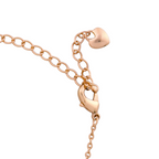 Adjustable extension chain with heart-shaped end on bracelet on a white background