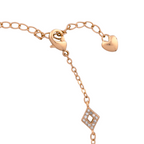 Adjustable extension chain with heart-shaped end detail on bracelet on a white background
