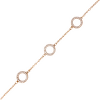 Close-up of open circle charm detailing on gold-plated chain bracelet on a white background