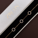 Gold-plated circle bracelet displayed in Zircon Jewels gift box