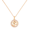 Gold-plated necklace with a round pendant featuring an Om symbol inside a clear stone halo on a white background