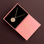 Round Om symbol pendant necklace in a Zircon Jewels gift box