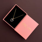 Emerald-green heart halo pendant necklace in a Zircon Jewels gift box