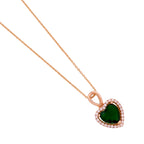 Close-up of the emerald-green heart halo pendant detail