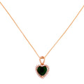 Heart-shaped green gemstone pendant on a rose gold chain against a white background