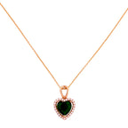 Heart-shaped green gemstone pendant on a rose gold chain against a white background