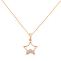 Gold-plated star outline pendant necklace with pavé detail on a white background