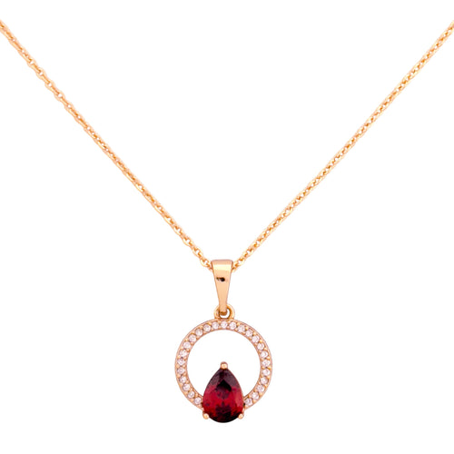 Gold-plated necklace with a teardrop red stone pendant and pavé halo on a white background