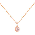 Gold-plated necklace with a cushion-cut solitaire pendant in a bezel setting on a white background