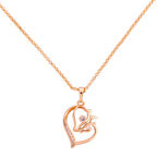 Gold-plated heart pendant necklace with a horse head design on a white background
