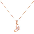 Gold-plated necklace with a heart-and-infinity pendant and a pavé heart cluster on a white background