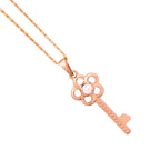 Close-up of the floral key pendant detail