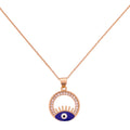 Gold-plated evil eye pendant necklace with a pavé circle frame on a white background