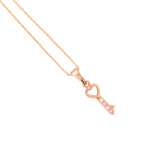 Close-up of the heart-shaped key pendant detail