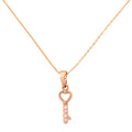 Key-shaped pendant with heart detail on a chain against a white background