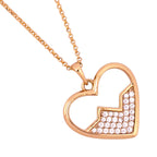 Open pavé heart pendant necklace shown at an angle highlighting the geometric heart outline and stones on one side